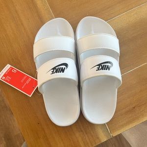 Woman’s Nike slides size 6 NWT